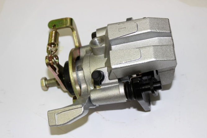 тормозной суппорт задний левый (в сборе с колодками)